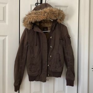 Like new brown jacket w fur lined hoodie.